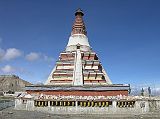 Tibet Guge 04 Tholing 01 Chorten 1 Outside the enclosure, at the four angles, but at unequal distances are four great Labab chorten, that is to say chorten which carry on their four sides four staircases; they commemorate, according to the Indo-Tibetan tradition, the ascent of Buddha to the Tusita paradise, when he went to preach the gospel there to his mother, already ascended there after his earthly death. - Giuseppi Tucci: Secrets of Tibet (September 19, 1933)